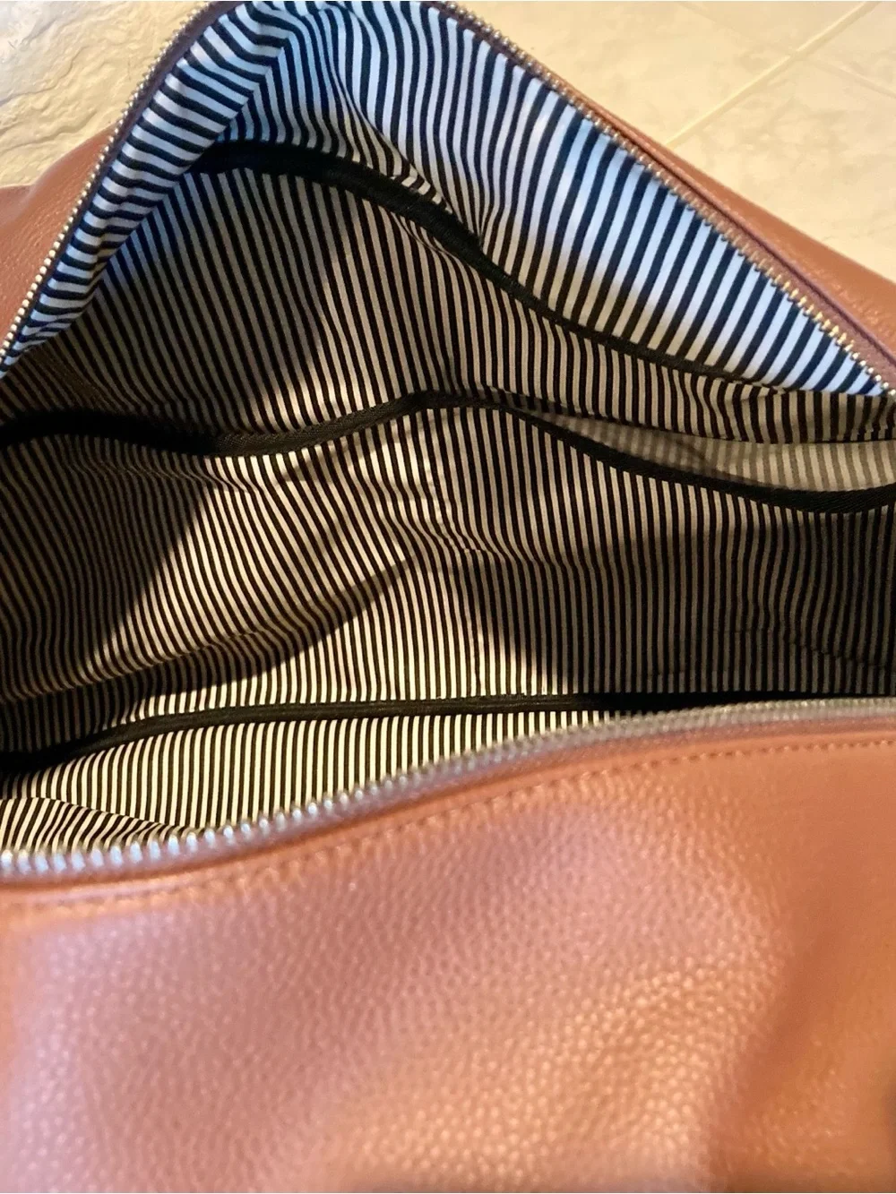 NWOT Davidson rolling duffel bag by “Brouk” and Co.